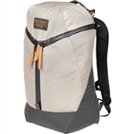 Mystery Ranch Catalyst 18â„¢ 18L backpack in black, shown with 3-ZIP access open, laptop sleeve, and top lid organizer pocket.