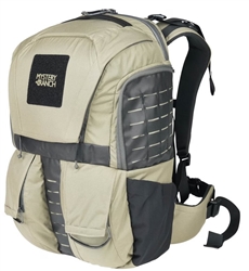 Mystery Ranch Rip Ruck 32™ in coyote, showing molded back panel, rip-zip lid, front admin pocket, PALS webbing, and side water bottle pockets.